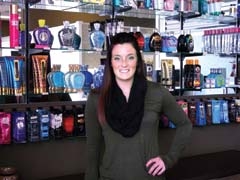 Caitlin Smith has been an employee at Touch of Sun for four years.