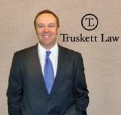 Attorney and Counselor at Law John P. Truskett.