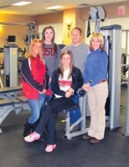 Fitness Time staff and owners (L to R): Ashley Long; Sara Roberts; Dr. Kyle Hrdlicka, owner; Leslie Cohen, owner; and Cassidy Meisinger (seated). (Not pictured: Ladonna Bolen, Kate Cagle, Erin Steidley and Claire Tanner.)
