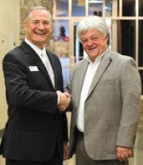 BTC Broadband President Scott Floyd, left, and Bixby Mayor John Easton congratulate each other following a press conference announcing that Bixby becomes the first city in Oklahoma to have fiber based gigabit Internet service.