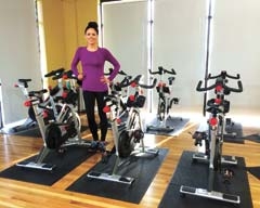 Natalie McIninch leads spin classes at Fitness Time for Ladies.