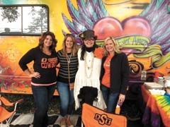 Melanie with friends at an OSU tailgate.
